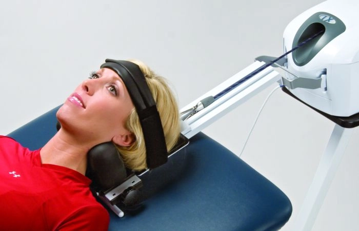 Cervical traction being performed