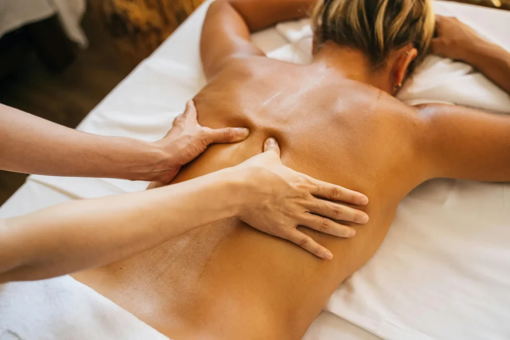 A woman receiving massage therapy